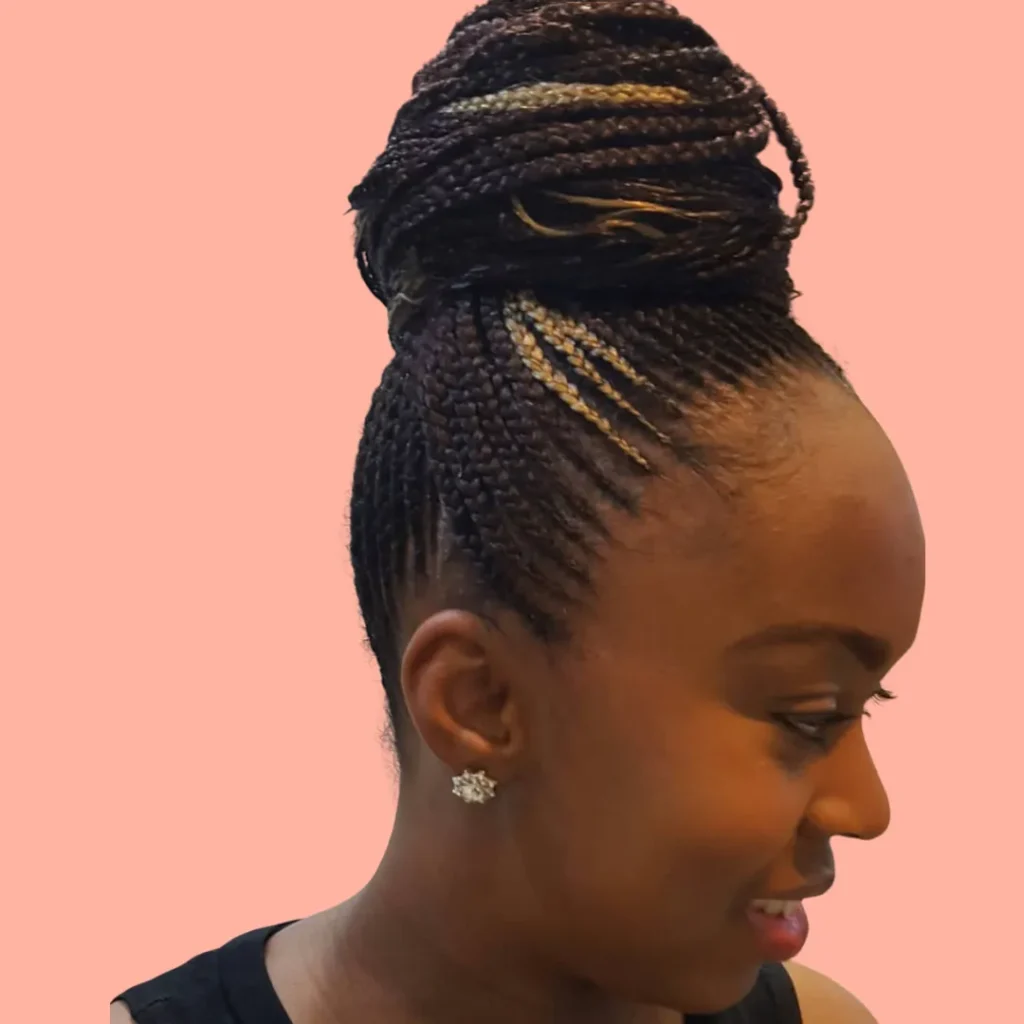 Cornrow updo braided by Maureen