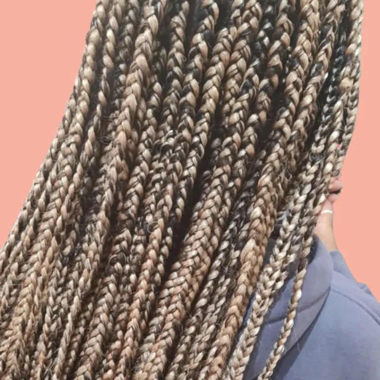 Client with long blonde-brown box braids