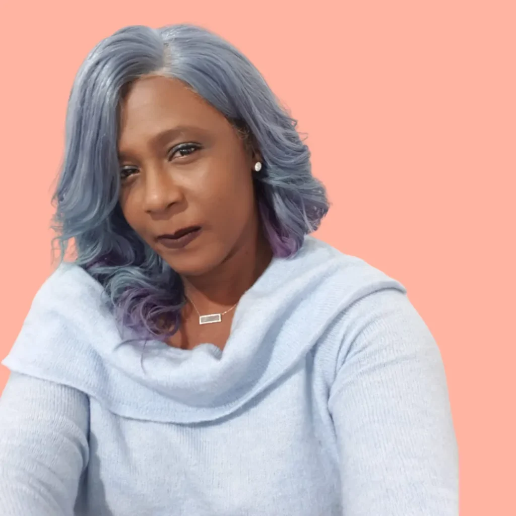 Client with silver-blue waves styled by Maureen